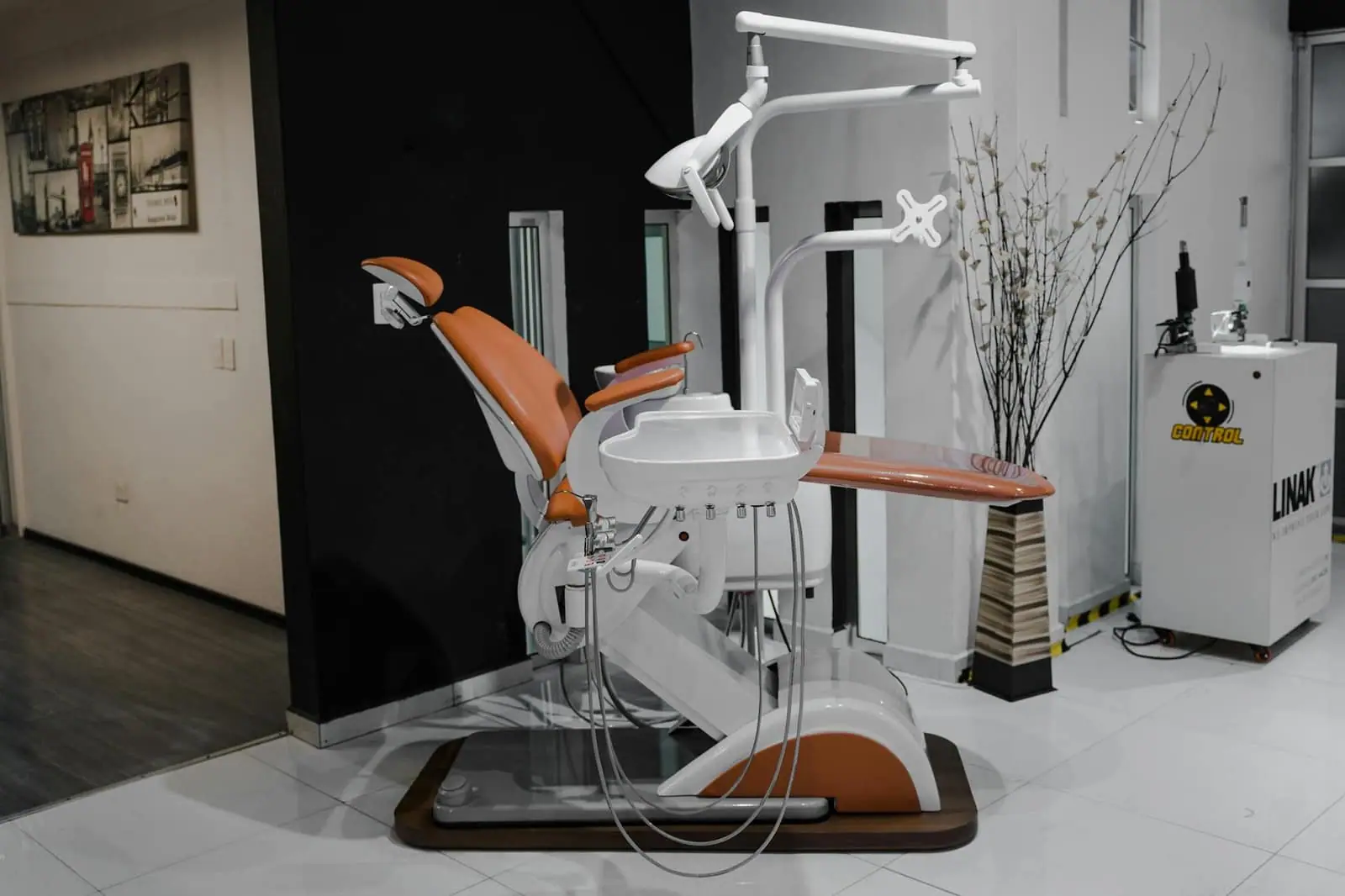 A contemporary dental clinic featuring a state-of-the-art dental chair and equipment.